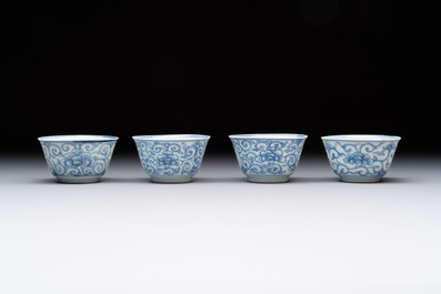 Ten Chinese blue and white cups and eleven saucers, Kangxi