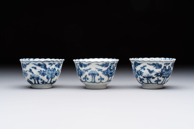 A set of six Chinese blue and white cups and saucers with floral design, Kangxi