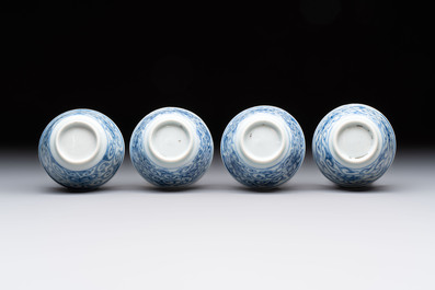 Ten Chinese blue and white cups and eleven saucers, Kangxi