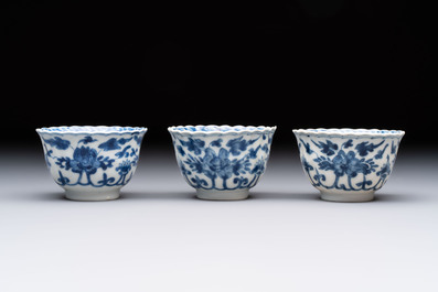 A set of six Chinese blue and white cups and saucers with floral design, Kangxi