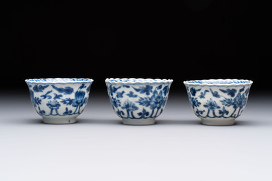 A set of six Chinese blue and white cups and saucers with floral design, Kangxi