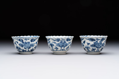 A set of six Chinese blue and white cups and saucers with floral design, Kangxi