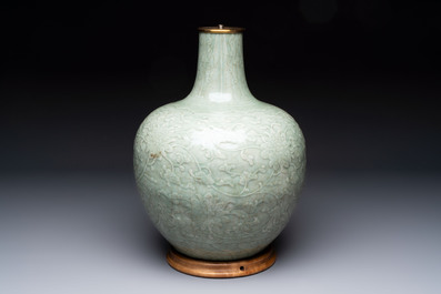 A Chinese celadon-glazed 'lotus scroll' globular vase mounted as lamp, 19th C.