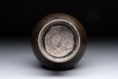 A Chinese archaistic bronze vase with 'mythical beast' handles, Yuan/Ming