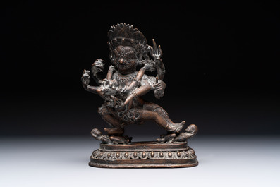 A Tibetan or Nepalese turquoise-inlaid partly-gilt bronze figure of White Tara and a figure of Makahala, 20th C.