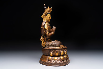 A Tibetan or Nepalese turquoise-inlaid partly-gilt bronze figure of White Tara and a figure of Makahala, 20th C.
