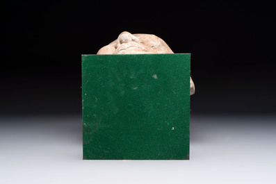 A Chinese sandstone head of a Luohan, Ming