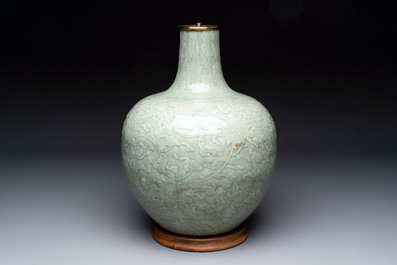 A Chinese celadon-glazed 'lotus scroll' globular vase mounted as lamp, 19th C.