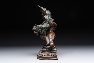 A Tibetan or Nepalese turquoise-inlaid partly-gilt bronze figure of White Tara and a figure of Makahala, 20th C.