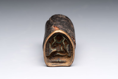 A Tibetan copper Gawu box and tsa tsa mold, 19th C.