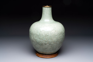 A Chinese celadon-glazed 'lotus scroll' globular vase mounted as lamp, 19th C.