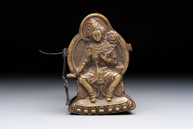 A Tibetan copper Gawu box and tsa tsa mold, 19th C.