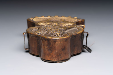 A Tibetan copper Gawu box and tsa tsa mold, 19th C.
