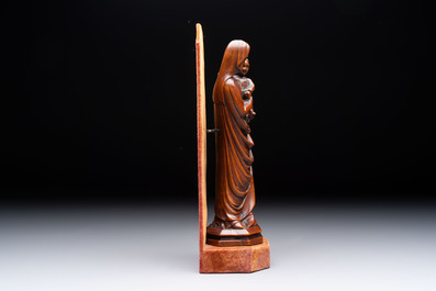 A carved boxwood sculpture of Madonna and Child, France or Italy, 19th C.