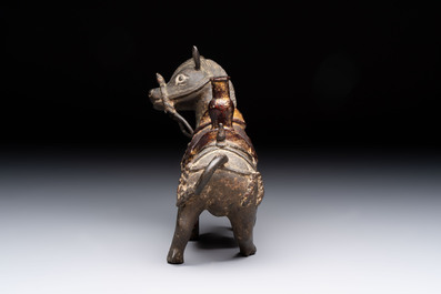 A rare Chinese partly gilt-lacquered bronze horse-from incense holder, Yuan/early Ming