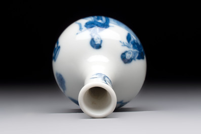 A fine Chinese blue and white miniature bottle vase with two ladies in a garden, jade 玉 mark, Kangxi