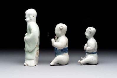 Nine Chinese blue, white, celadon-glazed and famille rose figures, 18/19th C.