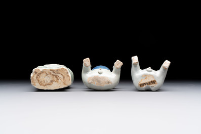 Nine Chinese blue, white, celadon-glazed and famille rose figures, 18/19th C.