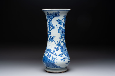 A Chinese blue and white vase with birds among flowering branches, Kangxi