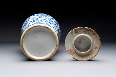 Two pairs of Chinese blue and white covered vases and a large covered vase, 19th C.