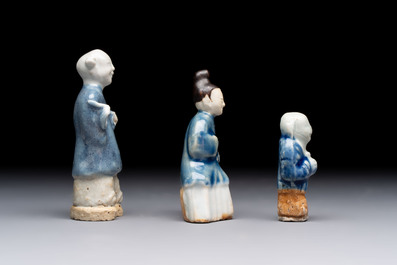 Nine Chinese blue, white, celadon-glazed and famille rose figures, 18/19th C.
