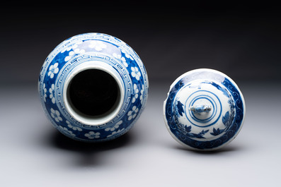 Two pairs of Chinese blue and white covered vases and a large covered vase, 19th C.