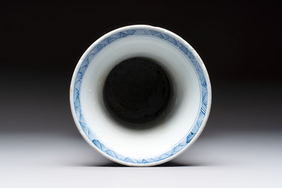 A Chinese blue and white vase with birds among flowering branches, Kangxi