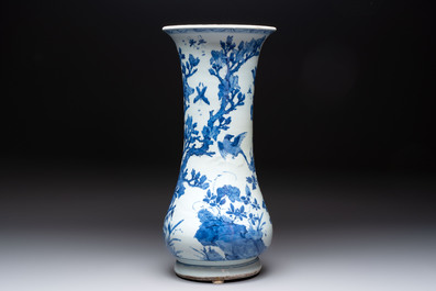 A Chinese blue and white vase with birds among flowering branches, Kangxi