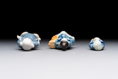 Nine Chinese blue, white, celadon-glazed and famille rose figures, 18/19th C.