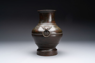 A fine Chinese archaistic bronze 'hu' vase, Song/Yuan