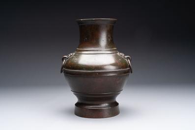 A fine Chinese archaistic bronze 'hu' vase, Song/Yuan