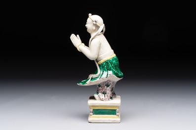 A Chinese sancai-glazed figure of Sudhana, 19th C.