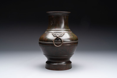 A fine Chinese archaistic bronze 'hu' vase, Song/Yuan