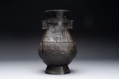 A large Chinese archaistic arrow vase with 'taotie' design, 'touhu 投壺', Yuan/Ming
