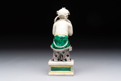 A Chinese sancai-glazed figure of Sudhana, 19th C.