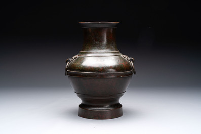A fine Chinese archaistic bronze 'hu' vase, Song/Yuan