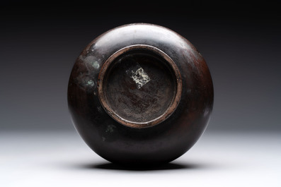 A Chinese archaistic bronze vase with dragon-form handles, Yuan/Ming