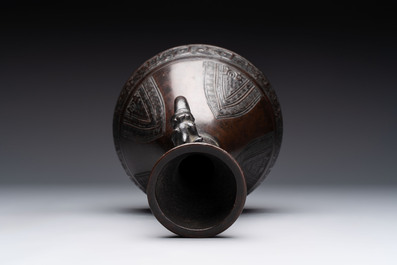 A Chinese archaistic bronze vase with dragon-form handles, Yuan/Ming