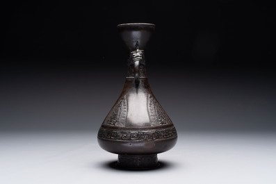 A Chinese archaistic bronze vase with dragon-form handles, Yuan/Ming
