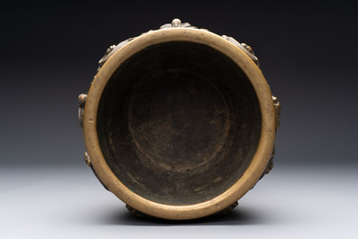 A Chinese bronze cylindrical censer with relief dragon design, Xuande mark, 18/19th C.