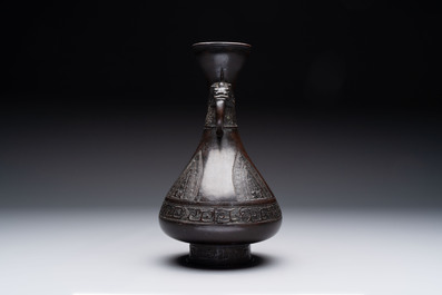 A Chinese archaistic bronze vase with dragon-form handles, Yuan/Ming