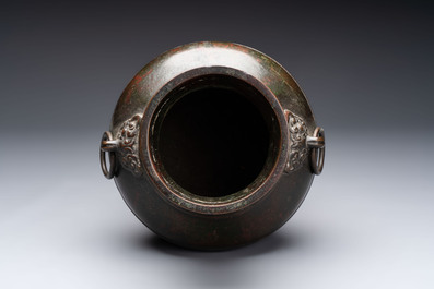 A fine Chinese archaistic bronze 'hu' vase, Song/Yuan