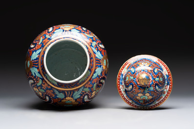 A Chinese English-decorated blue and white vase and cover, Kangxi