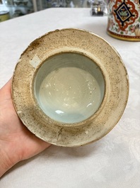 A Chinese English-decorated blue and white vase and cover, Kangxi