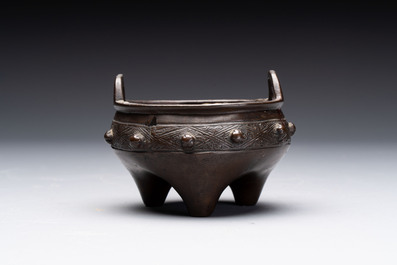 A Chinese archaistic bronze vase and a tripod censer, Yuan