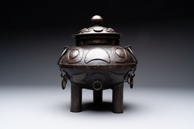 An unusual Chinese gold- and silver-inlaid iron censer and cover, Xuande mark, Ming