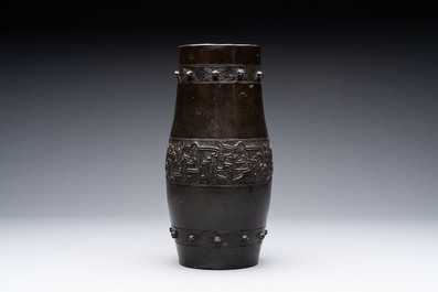A Chinese archaistic bronze vase and a tripod censer, Yuan