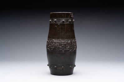 A Chinese archaistic bronze vase and a tripod censer, Yuan