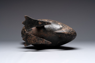 A large Qajar damascened steel bird-form sculpture, Persia, 19th C.