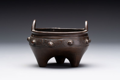 A Chinese archaistic bronze vase and a tripod censer, Yuan